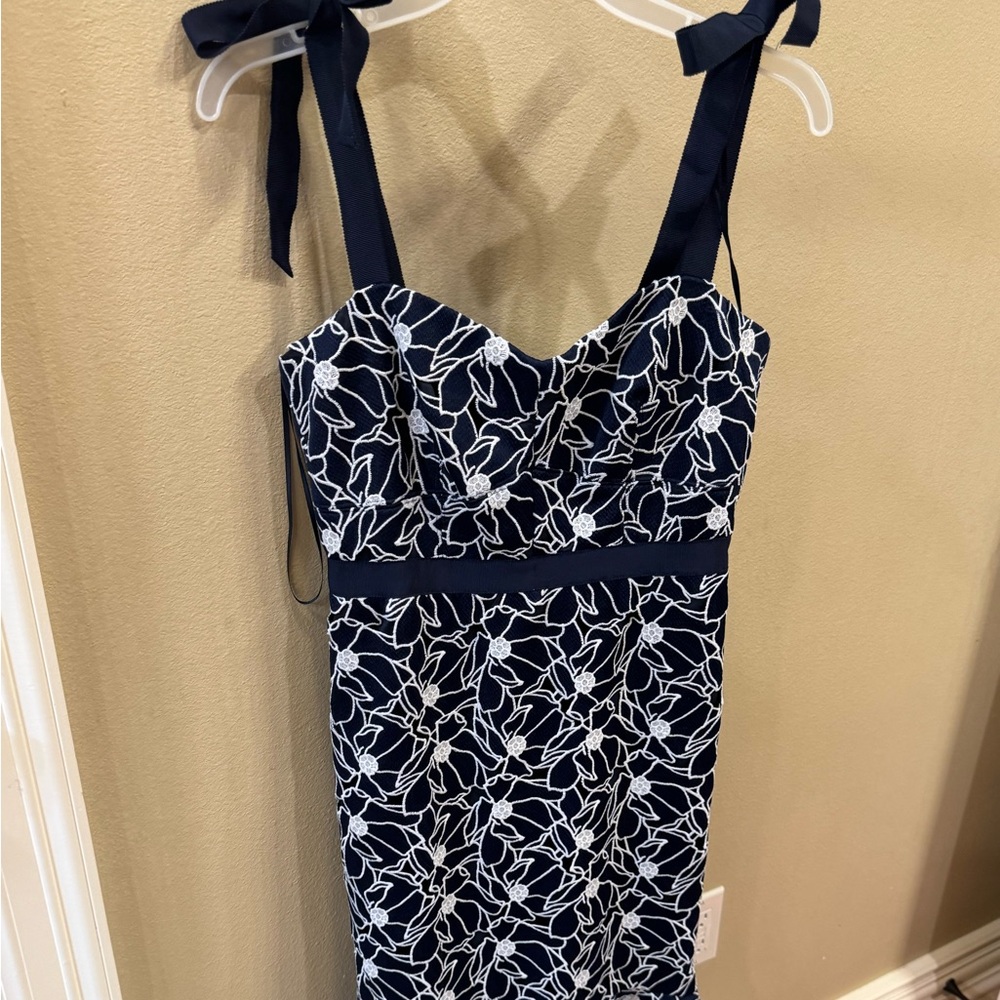 Navy lace midi dress from J. Crew.